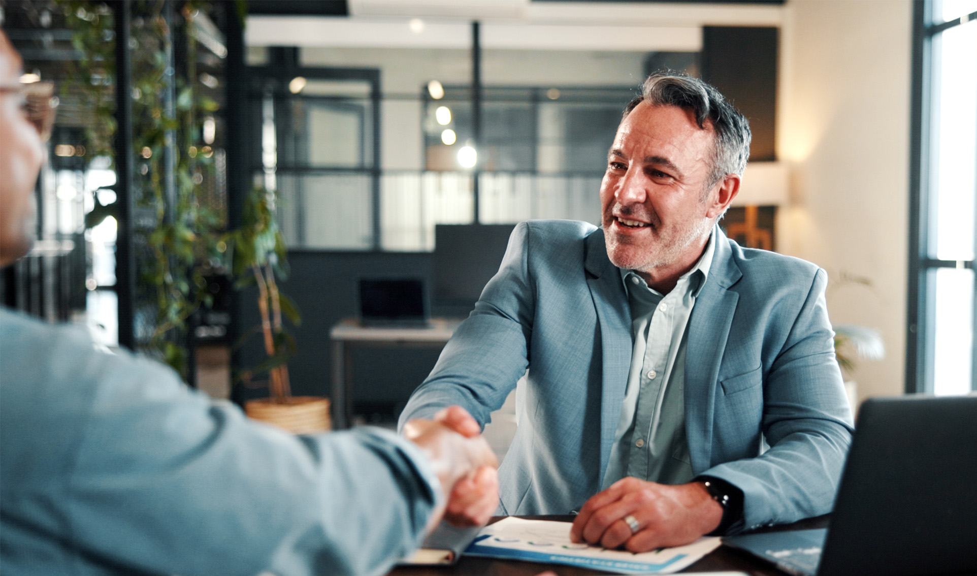 Two men in a business deal