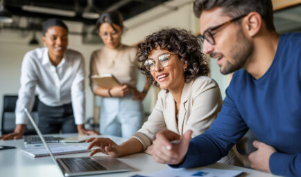 Business finance professionals reviewing commercial payments and financial workflows.
